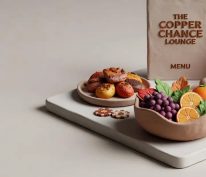 Clay-inspired table setting with share plates and cocktails in The Copper Chance lounge.